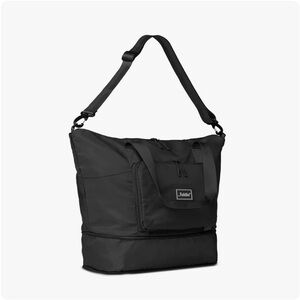 Black Travel Bag with Adjustable Strap and Modern Design- The foldie